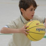 boy with basketball in the gym